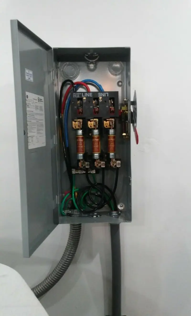 Three-phase disconnect switch installed for Smoke Detector Installation in Brevard