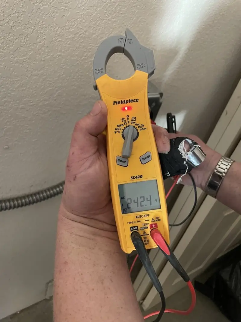 Voltage testing with clamp meter during Aluminum Wiring Replacement in Brevard